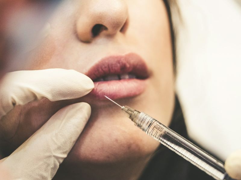 Close-up of a fine syringe used for injectable treatments